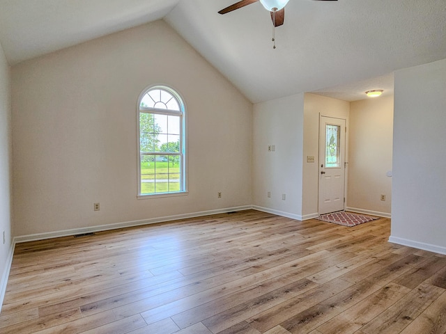 186 Amber Ln, Hustonville, KY 40437 - empty room featuring healthy amount of natural light, a ceiling fan, light wood-style flooring, and lofted ceiling