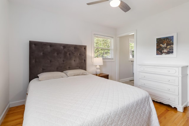 131 Reasor St, Corbin, KY 40701 - bedroom with light wood-type flooring, baseboards, and ceiling fan
