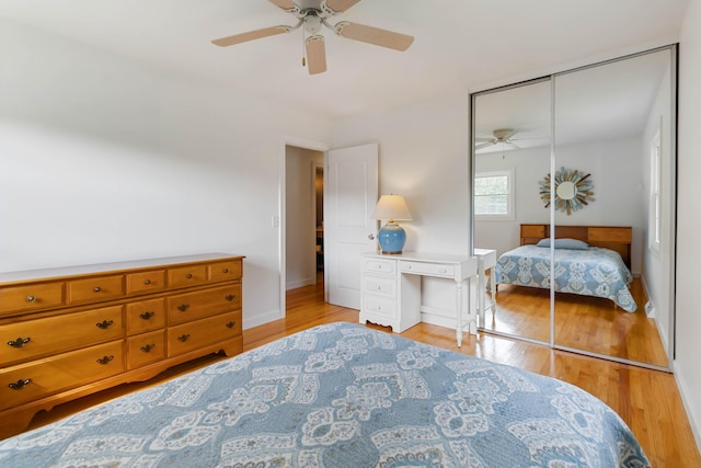 131 Reasor St, Corbin, KY 40701 - bedroom with light wood-type flooring, a ceiling fan, baseboards, and a closet