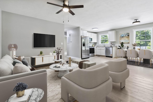 56 Hopewell Church Rd, Corbin, KY 40701 - living area featuring light wood finished floors and ceiling fan