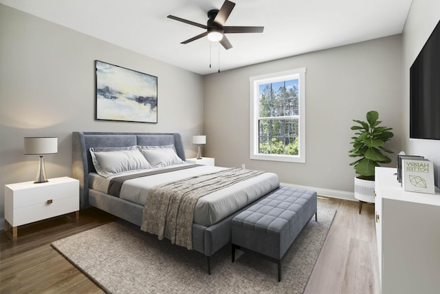 56 Hopewell Church Rd, Corbin, KY 40701 - bedroom featuring baseboards, wood finished floors, and ceiling fan