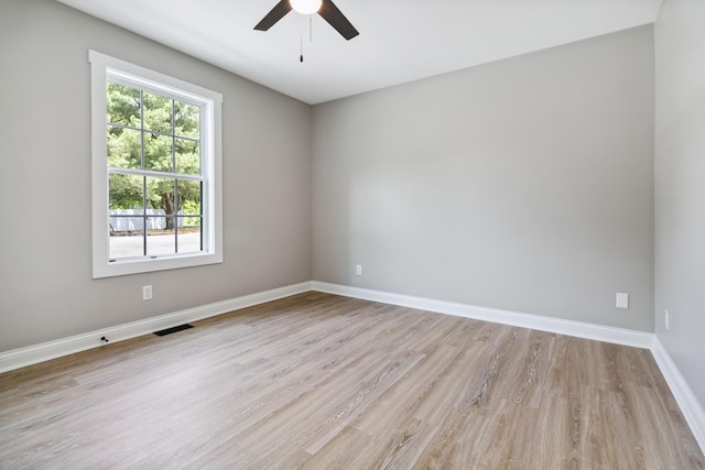 56 Hopewell Church Rd, Corbin, KY 40701 - empty room featuring a ceiling fan, light wood-style flooring, and baseboards