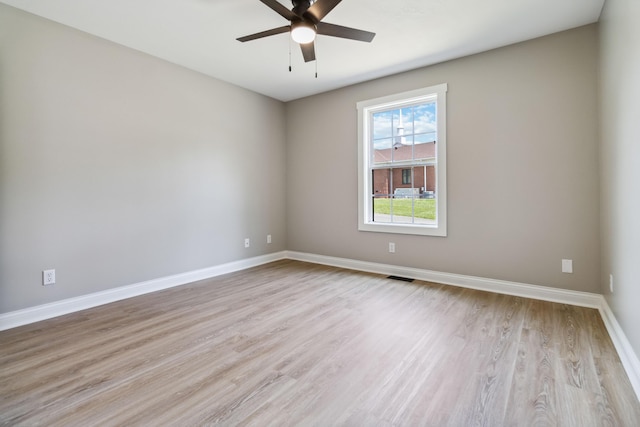 56 Hopewell Church Rd, Corbin, KY 40701 - unfurnished room with a ceiling fan, light wood-type flooring, and baseboards