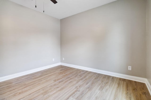 56 Hopewell Church Rd, Corbin, KY 40701 - empty room with light wood-style floors, baseboards, and a ceiling fan