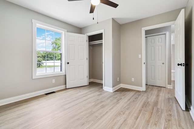 56 Hopewell Church Rd, Corbin, KY 40701 - unfurnished bedroom featuring light wood-style flooring, baseboards, a closet, and ceiling fan