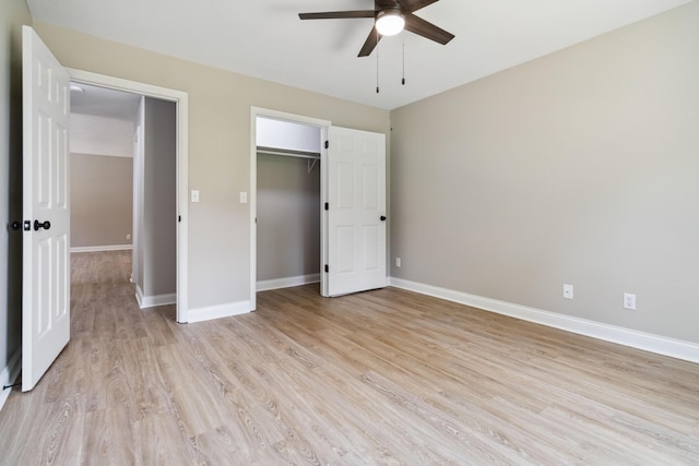 56 Hopewell Church Rd, Corbin, KY 40701 - unfurnished bedroom with light wood-style floors, baseboards, a closet, and a ceiling fan