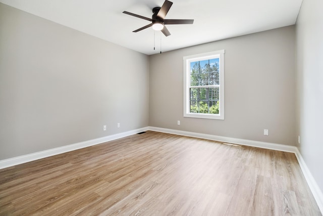 56 Hopewell Church Rd, Corbin, KY 40701 - unfurnished room with light wood-style flooring, ceiling fan, and baseboards
