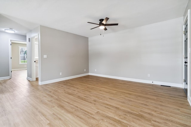 56 Hopewell Church Rd, Corbin, KY 40701 - spare room featuring a ceiling fan, light wood-style floors, and baseboards