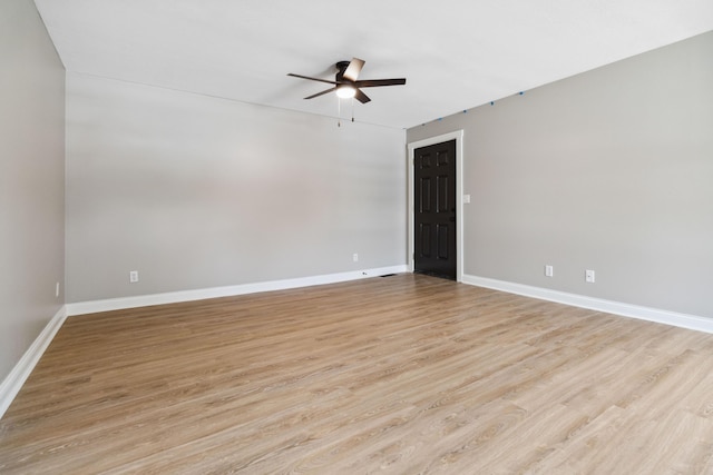 56 Hopewell Church Rd, Corbin, KY 40701 - unfurnished room featuring a ceiling fan, light wood-style floors, and baseboards