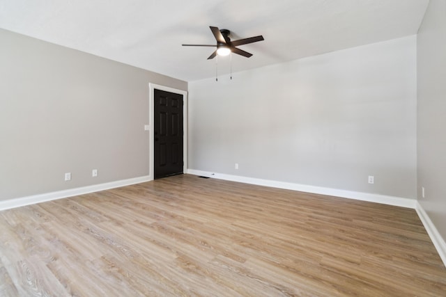 56 Hopewell Church Rd, Corbin, KY 40701 - spare room featuring a ceiling fan, baseboards, and light wood-style flooring