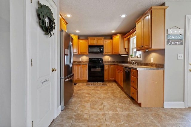 468 Whisper Woods Dr, Somerset, KY 42503 - kitchen featuring black appliances, recessed lighting, dark countertops, a textured ceiling, and light tile patterned flooring