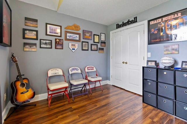 468 Whisper Woods Dr, Somerset, KY 42503 - living area with dark wood-style flooring and a textured ceiling