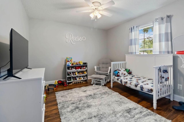 468 Whisper Woods Dr, Somerset, KY 42503 - bedroom featuring wood finished floors, a textured ceiling, and ceiling fan