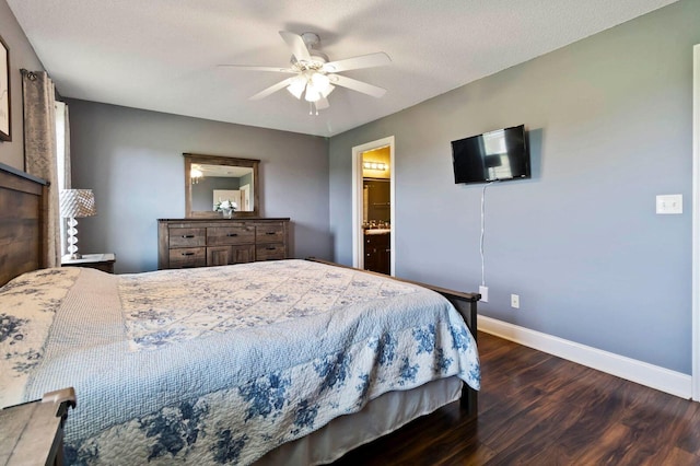 468 Whisper Woods Dr, Somerset, KY 42503 - bedroom with dark wood-style floors, ceiling fan, and connected bathroom