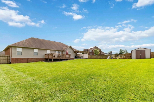 468 Whisper Woods Dr, Somerset, KY 42503 - fenced backyard featuring a storage unit, a playground, and a wooden deck