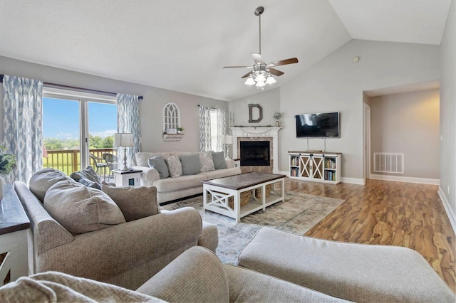 468 Whisper Woods Dr, Somerset, KY 42503 - living room with a ceiling fan, a fireplace, wood finished floors, and high vaulted ceiling