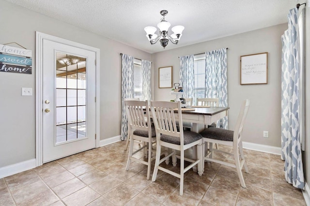 468 Whisper Woods Dr, Somerset, KY 42503 - dining space featuring a chandelier and a textured ceiling