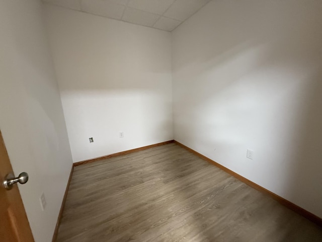 1090 Laurel Cove Rd, London, KY 40744 - spare room with a drop ceiling, wood finished floors, and baseboards