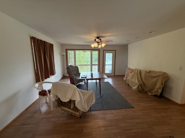 1090 Laurel Cove Rd, London, KY 40744 - living area featuring wood finished floors, a ceiling fan, and baseboards