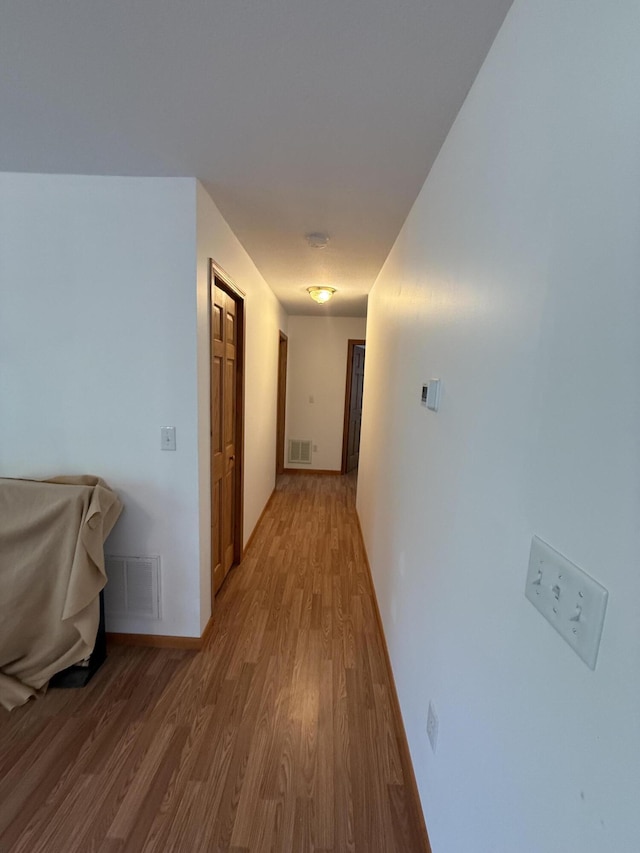1090 Laurel Cove Rd, London, KY 40744 - hallway featuring light wood-style floors and baseboards