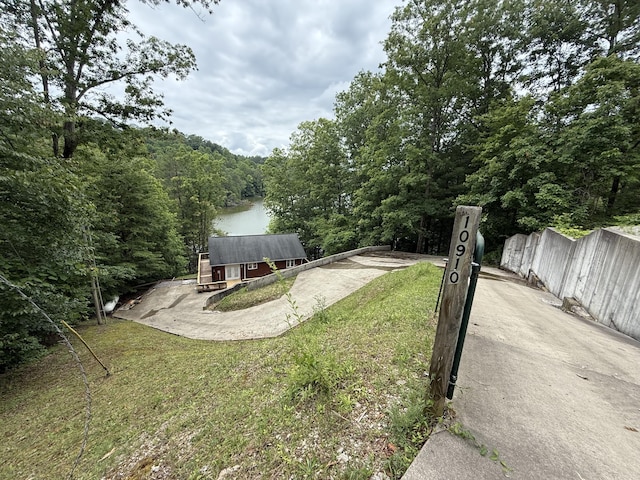 1090 Laurel Cove Rd, London, KY 40744 - view of green lawn featuring a view of trees and a water view
