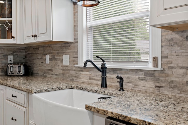 795 Allendale Dr, Lexington, KY 40503 - kitchen with a sink, healthy amount of natural light, white cabinetry, and glass insert cabinets