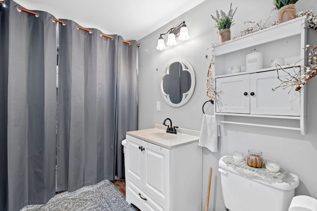795 Allendale Dr, Lexington, KY 40503 - full bath featuring toilet, vanity, wood finished floors, and a shower with shower curtain