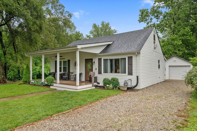 795 Allendale Dr, Lexington, KY 40503 - view of front of property with covered porch, gravel driveway, an outbuilding, a shingled roof, and a garage