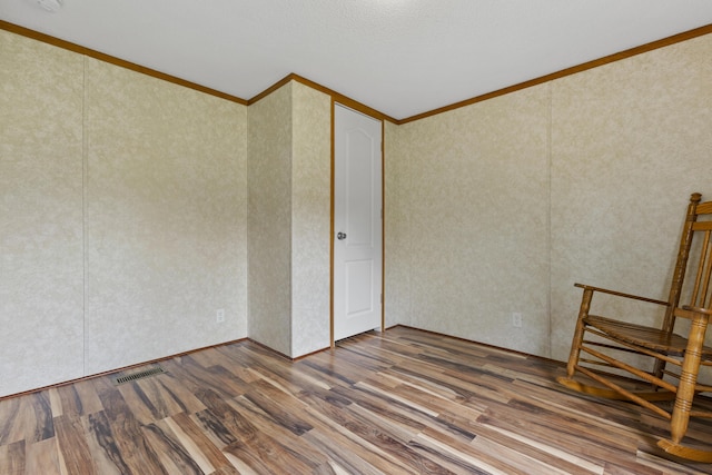 6125 Cincinnati Pike, Sadieville, KY 40370 - spare room with ornamental molding and wood finished floors