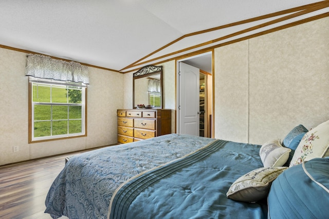 6125 Cincinnati Pike, Sadieville, KY 40370 - bedroom with wood finished floors, lofted ceiling, and crown molding
