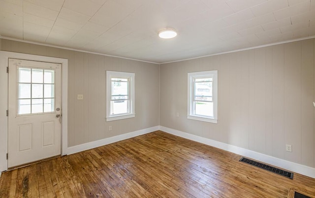 100 Mcdonald St, Nicholasville, KY 40356 - entryway with hardwood / wood-style floors, ornamental molding, plenty of natural light, and baseboards
