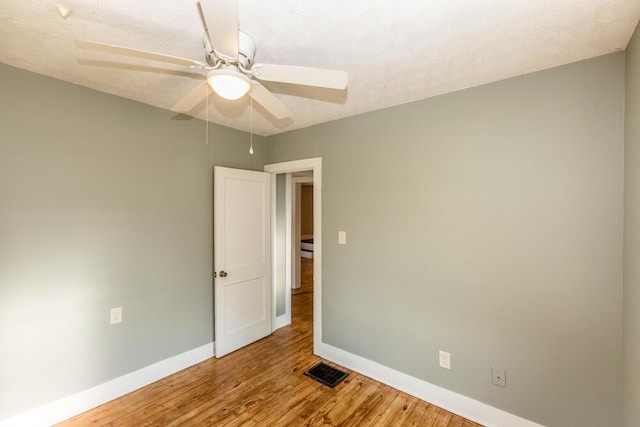 100 Mcdonald St, Nicholasville, KY 40356 - spare room with baseboards, wood finished floors, and a ceiling fan