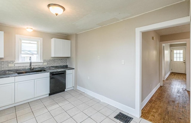 100 Mcdonald St, Nicholasville, KY 40356 - kitchen featuring dishwasher, a sink, dark countertops, backsplash, and healthy amount of natural light