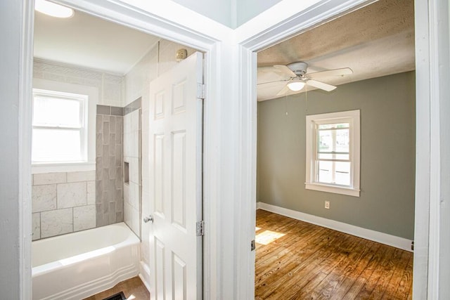 100 Mcdonald St, Nicholasville, KY 40356 - full bath with hardwood / wood-style flooring, ceiling fan, and baseboards