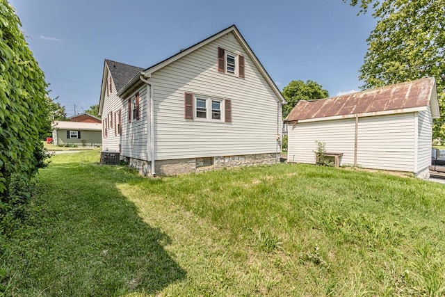 100 Mcdonald St, Nicholasville, KY 40356 - rear view of house with a yard and central AC