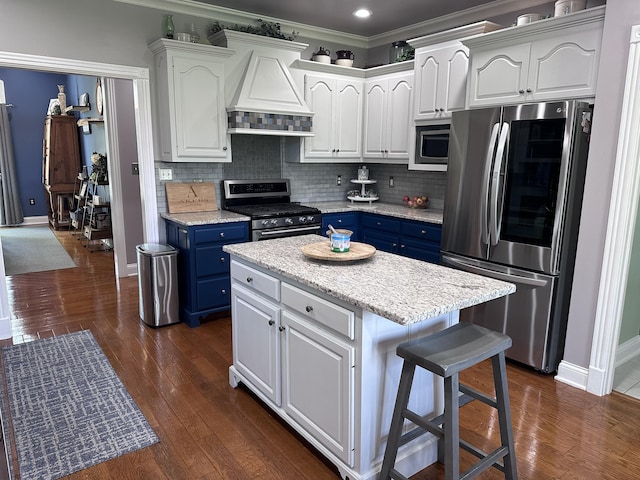 1404 Clubhouse Ln, Mt Sterling, KY 40353 - kitchen featuring appliances with stainless steel finishes, blue cabinetry, premium range hood, white cabinets, and ornamental molding