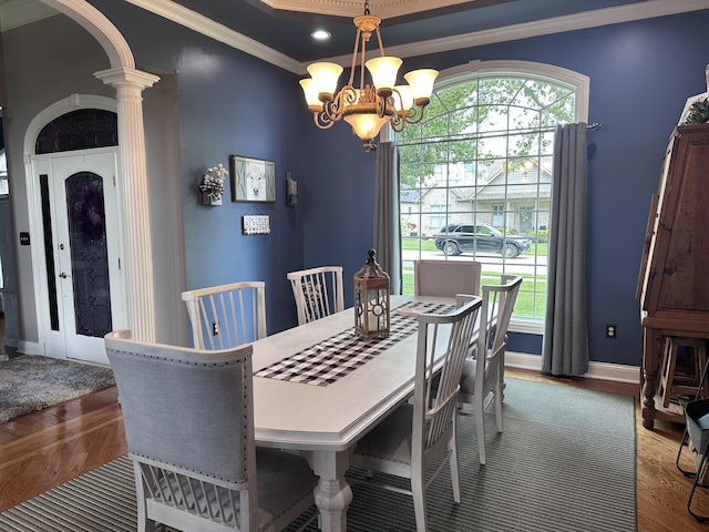 1404 Clubhouse Ln, Mt Sterling, KY 40353 - dining room with ornate columns, a chandelier, crown molding, wood finished floors, and baseboards