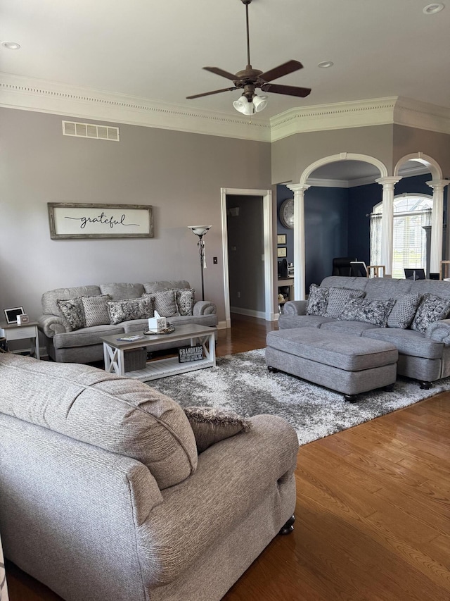 1404 Clubhouse Ln, Mt Sterling, KY 40353 - living area with decorative columns, arched walkways, ceiling fan, ornamental molding, and wood finished floors