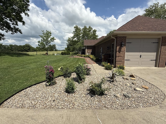 1404 Clubhouse Ln, Mt Sterling, KY 40353 - view of green lawn featuring an attached garage and driveway