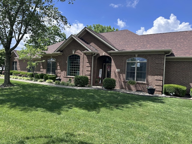 1404 Clubhouse Ln, Mt Sterling, KY 40353 - view of front of property featuring brick siding, a front lawn, and a shingled roof