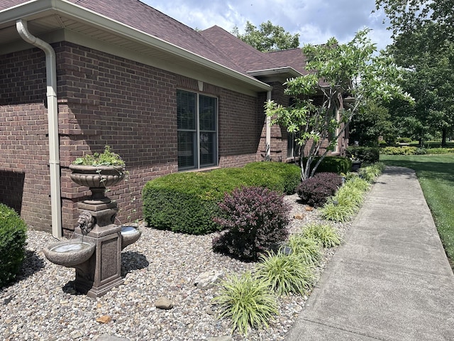 1404 Clubhouse Ln, Mt Sterling, KY 40353 - view of side of home featuring brick siding and a shingled roof