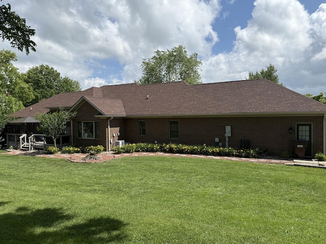 1404 Clubhouse Ln, Mt Sterling, KY 40353 - rear view of property featuring brick siding and a yard