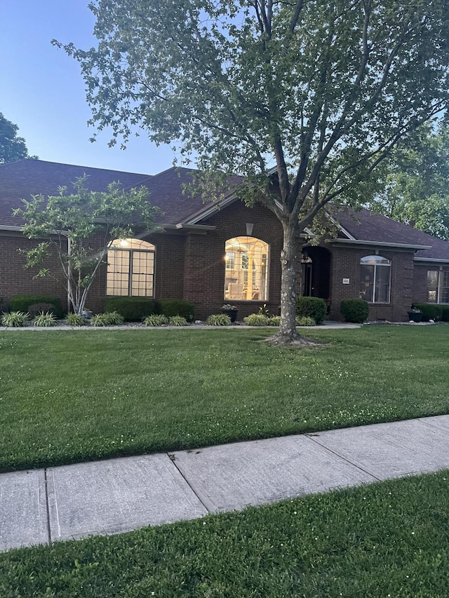 1404 Clubhouse Ln, Mt Sterling, KY 40353 - single story home with a front yard, brick siding, and a shingled roof