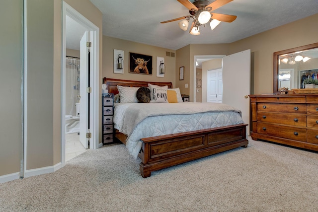 220 Mcdowell Dr, Winchester, KY 40391 - carpeted bedroom featuring a ceiling fan and connected bathroom