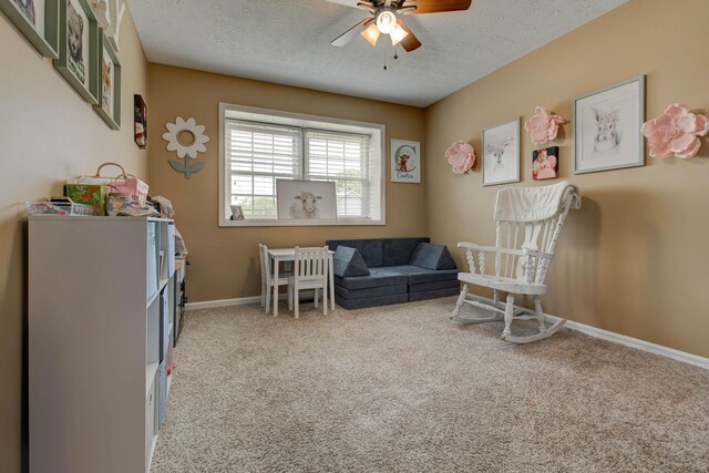 220 Mcdowell Dr, Winchester, KY 40391 - sitting room with ceiling fan, carpet flooring, and a textured ceiling