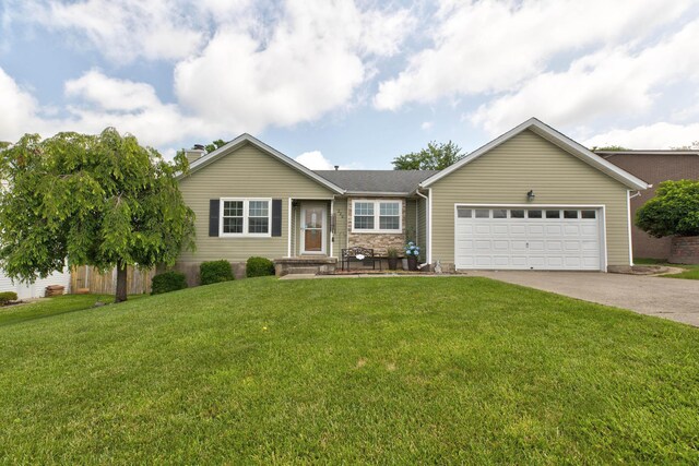 220 Mcdowell Dr, Winchester, KY 40391 - ranch-style home with concrete driveway, an attached garage, and a front yard