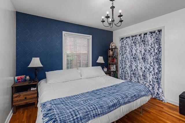 1128 Kiowa Trl, Frankfort, KY 40601 - bedroom featuring wood finished floors and a chandelier