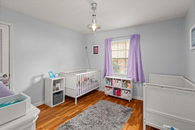 1128 Kiowa Trl, Frankfort, KY 40601 - bedroom with wood finished floors and a nursery area
