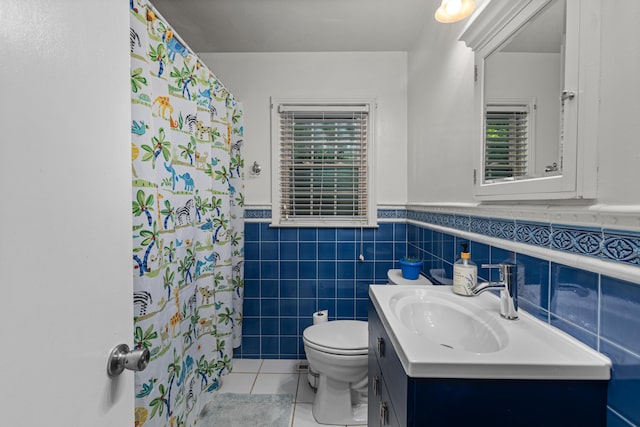 1128 Kiowa Trl, Frankfort, KY 40601 - bathroom with tile patterned flooring, vanity, a wainscoted wall, a shower with curtain, and tile walls