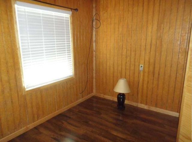 130 Morgan View Rd, Wellington, KY 40387 - spare room with wood finished floors, baseboards, and wooden walls